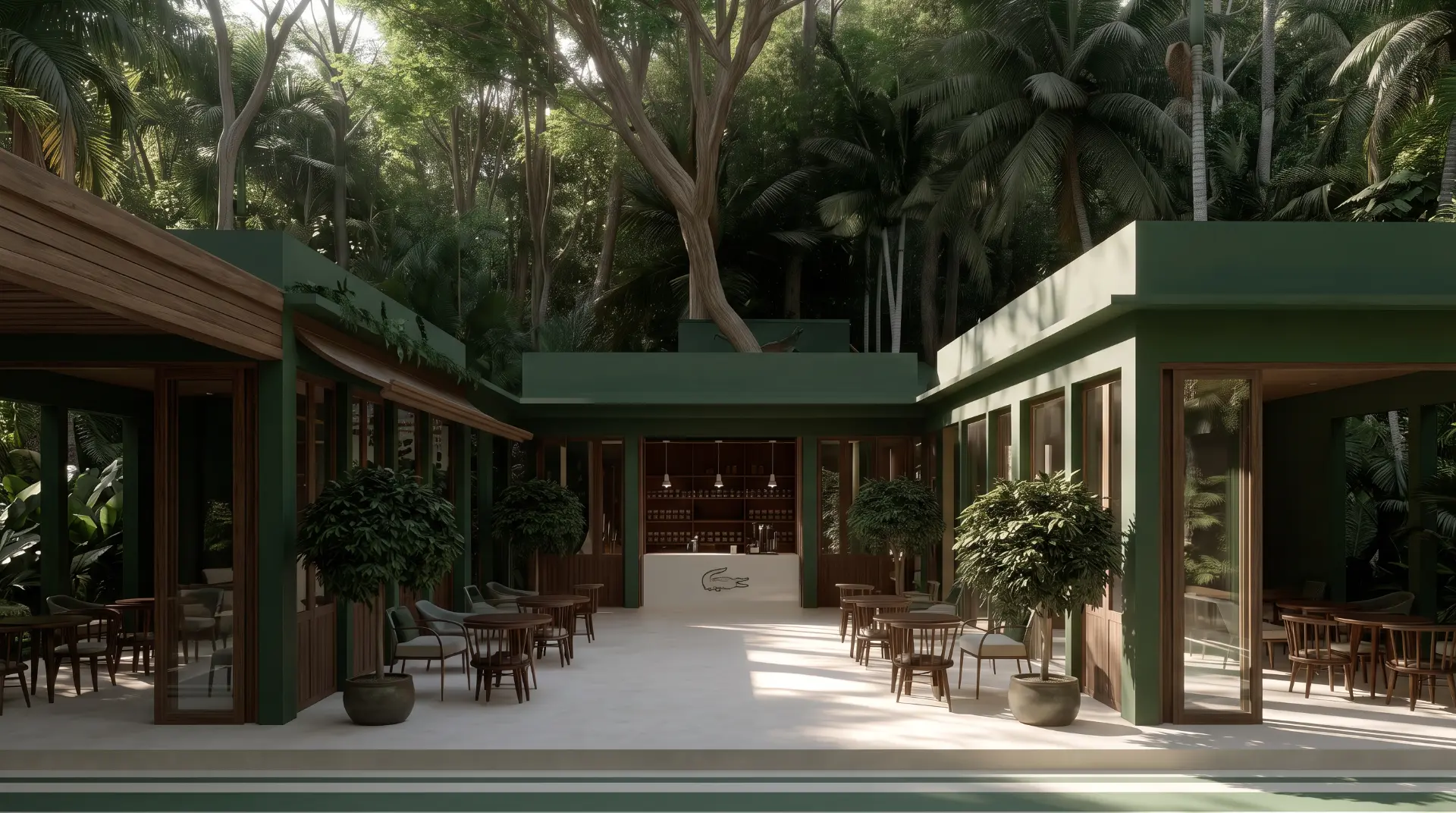 A green courtyard clubhouse surrounded by tropical forest with café seating