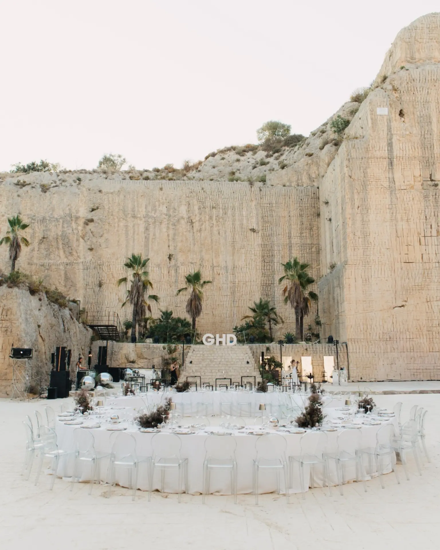 The round dinner table set in the quarry at the final event