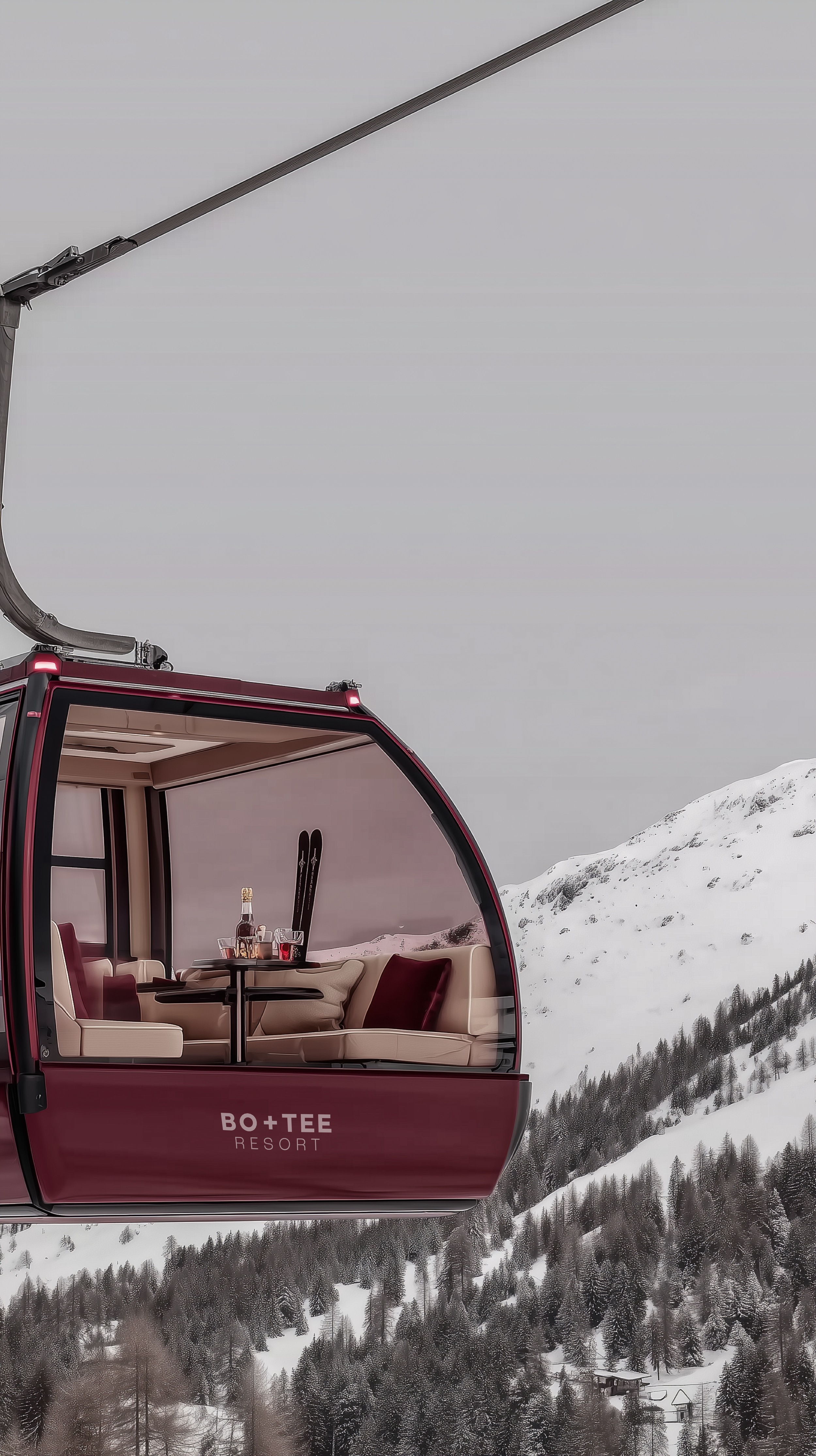 Bo+Tee Winter campaign: imagined burgundy gondola above a snowy forest